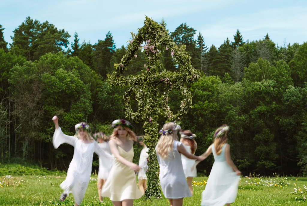 Midsummer celebration around a maypole in Sweden