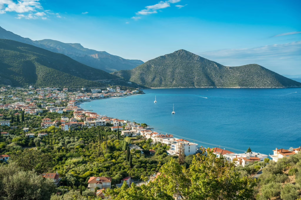 Coastal town beneath mountains in the Peloponnese, Greece